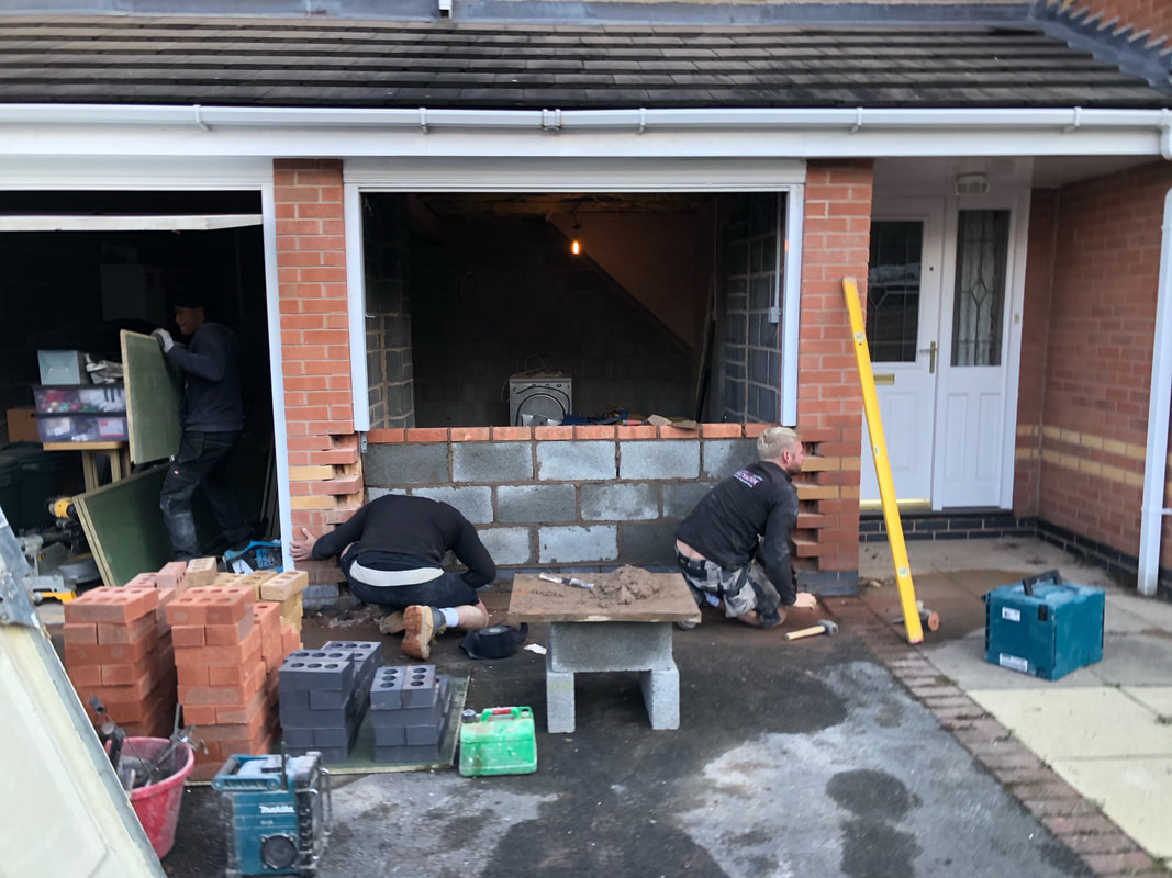 builder working on loft conversion