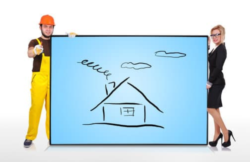 Builder holding up construction sign