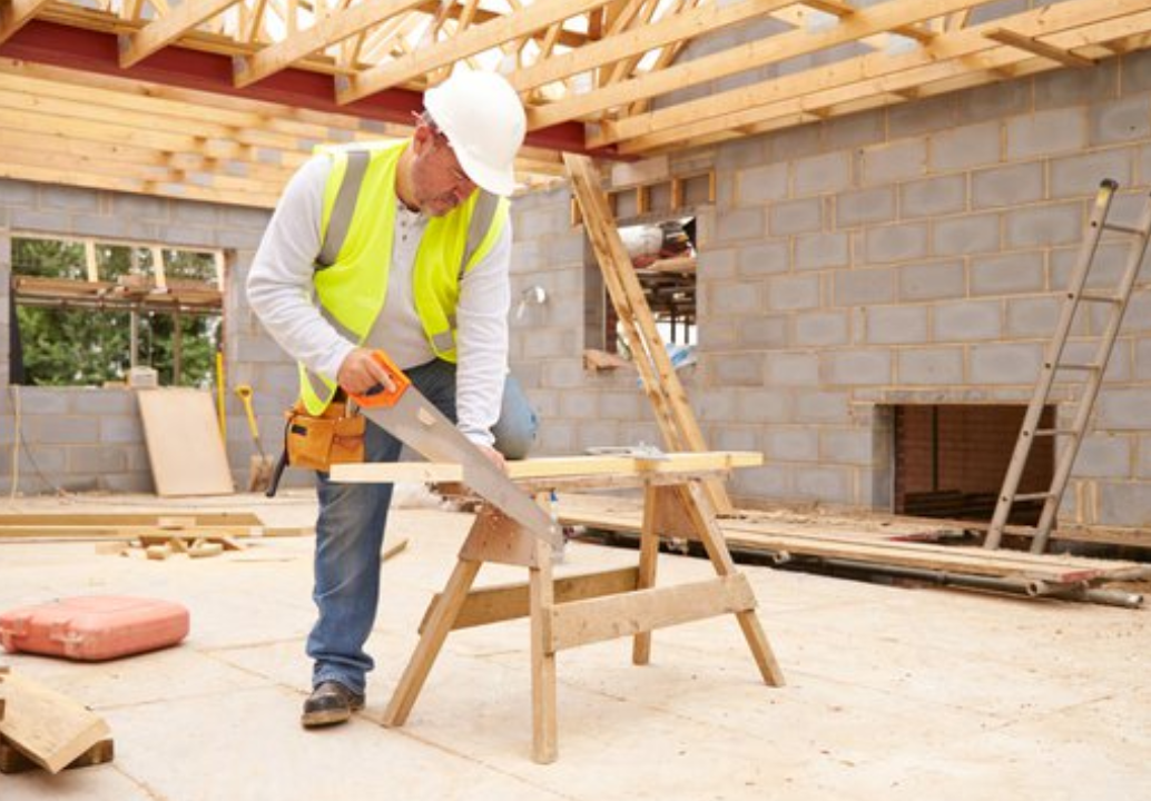 carpenter working on building site